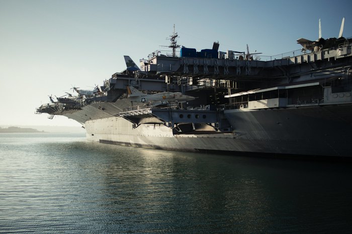 Gray navy warship on the water