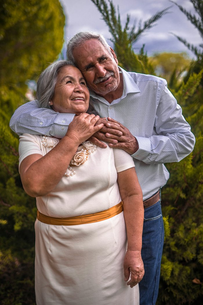 Older couple embracing and smiling